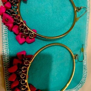 Gorgeous rare and collectible hoops with bright pink stones . Must have!